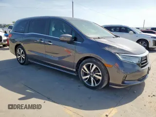 2023 Honda Odyssey Touring with VIN 5FNRL6H89PB053593, listed as a Copart auction lot 64836685 with 26,568 mi miles and Salvage title. Bid and sale history available at DreamBid. Image 4.