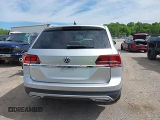 2018 Volkswagen Atlas SE z VIN 1V2DR2CAXJC521412, wystawiony jako IAAI lot #42309661 z przebiegiem 99 045 mil mil oraz . Historia ofert i sprzedaży dostępna na DreamBid. Obrazek 16.