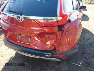 2018 Honda CR-V EX with VIN 2HKRW2H57JH604764, listed as a IAAI auction lot 41935099 with 156,459 mi miles and . Bid and sale history available at DreamBid. Image 6.