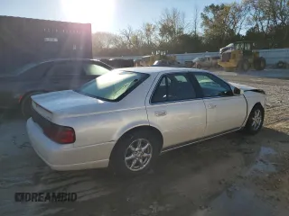 2000 Cadillac Seville Touring STS z VIN 1G6KY5497YU345038, wystawiony jako Copart lot #74315354 z przebiegiem 96 704 mil mil oraz Nie do naprawy • Non repairable. Historia ofert i sprzedaży dostępna na DreamBid. Obrazek 3.