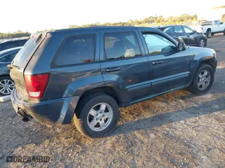 2007 Jeep Grand Cherokee Laredo with VIN 1J8GS48K17C655999, listed as a IAAI auction lot 41590500 with 290,695 mi miles. Bid and sale history available at carsss.com. Image 4.