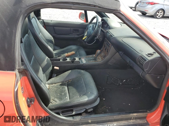 2000 BMW Z3 z VIN WBACH3346YLF71668, wystawiony jako Copart lot #54133775 z przebiegiem 147 065 mil mil oraz Czysty tytuł • Clean title. Historia ofert i sprzedaży dostępna na DreamBid. Obrazek 10.