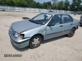 1994 Toyota Tercel DX z VIN JT2EL43T3R0489039, wystawiony jako Copart lot #67834034 z przebiegiem 139 726 mil mil oraz Szkody całkowita. Historia ofert i sprzedaży dostępna na DreamBid. Obrazek 1.