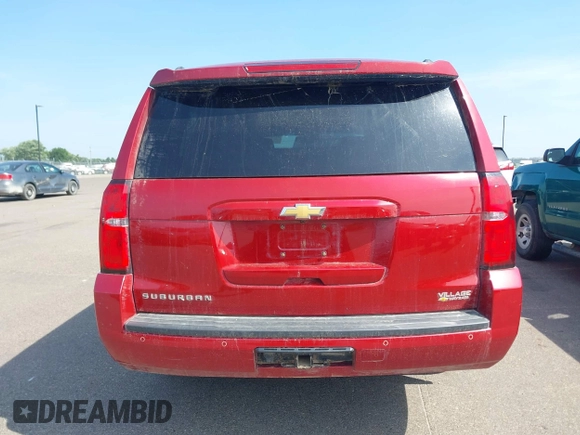 2015 Chevrolet Suburban LT with VIN 1GNSKJKC5FR726299, listed as a IAAI auction lot 42740904 with 96,700 mi miles and . Bid and sale history available at DreamBid. Image 16.