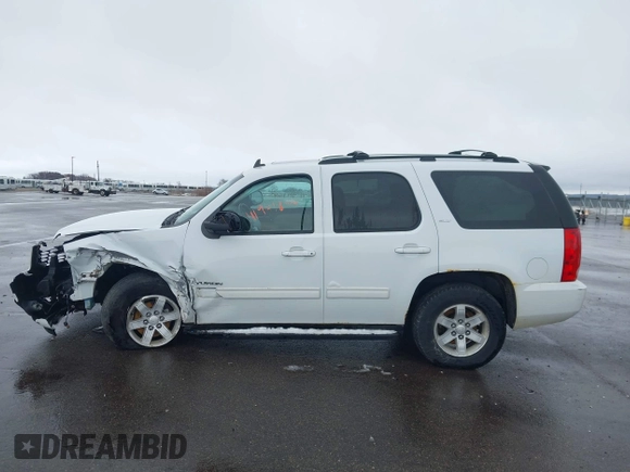 2011 GMC Yukon SLT with VIN 1GKS2CE03BR118690, listed as a IAAI auction lot 41941840 with 243,311 mi miles and . Bid and sale history available at DreamBid. Image 14.