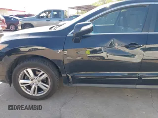 2014 Acura RDX Technology with VIN 5J8TB3H55EL001838, listed as a IAAI auction lot 41876530 with 214,266 mi miles and . Bid and sale history available at DreamBid. Image 6.