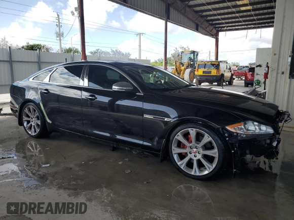 2014 Jaguar XJ Portfolio z VIN SAJWA2GZ4E8V60864, wystawiony jako Copart lot #76478674 z przebiegiem 50 578 mil mil oraz Szkoda całkowita • Salvage title. Historia ofert i sprzedaży dostępna na DreamBid. Obrazek 4.