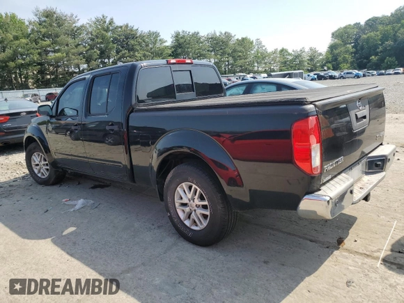 2014 Nissan Frontier SV with VIN 1N6AD0FV7EN736839, listed as a Copart auction lot 58390995 with 111,403 mi miles and Salvage title. Bid and sale history available at DreamBid. Image 2.