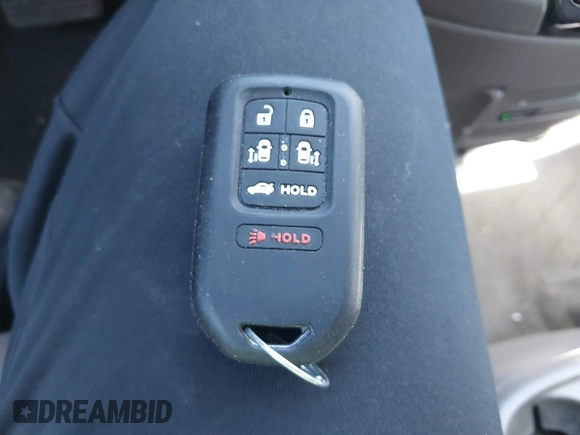 2014 Honda Odyssey Touring with VIN 5FNRL5H97EB101169, listed as a IAAI auction lot 41869233 with 142,147 mi miles and . Bid and sale history available at DreamBid. Image 11.