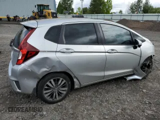 2015 Honda Fit EX-L with VIN 3HGGK5H84FM703169, listed as a Copart auction lot 57472305 with 176,377 mi miles and Salvage title. Bid and sale history available at DreamBid. Image 3.
