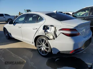 2022 Genesis G70 2.0T with VIN KMTG34TA7NU103693, listed as a Copart auction lot 73323644 with 10,901 mi miles and Salvage Title. Bid and sale history available at carsss.com. Image 2.
