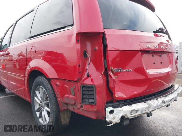 2014 Dodge Grand Caravan SXT with VIN 2C4RDGCG3ER257695, listed as a IAAI auction lot 41534568 with 116,896 mi miles and . Bid and sale history available at DreamBid. Image 6.
