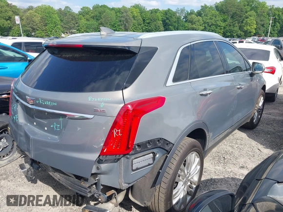 2017 Cadillac XT5 Premium Luxury FWD with VIN 1GYKNCRS4HZ304367, listed as a IAAI auction lot 42086993 with 162,273 mi miles and . Bid and sale history available at DreamBid. Image 4.