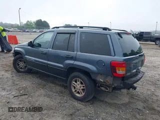 2002 Jeep Grand Cherokee Laredo z VIN 1J4GX48S62C201579, wystawiony jako IAAI lot #42102238 z przebiegiem 262 630 mil mil oraz . Historia ofert i sprzedaży dostępna na DreamBid. Obrazek 3.