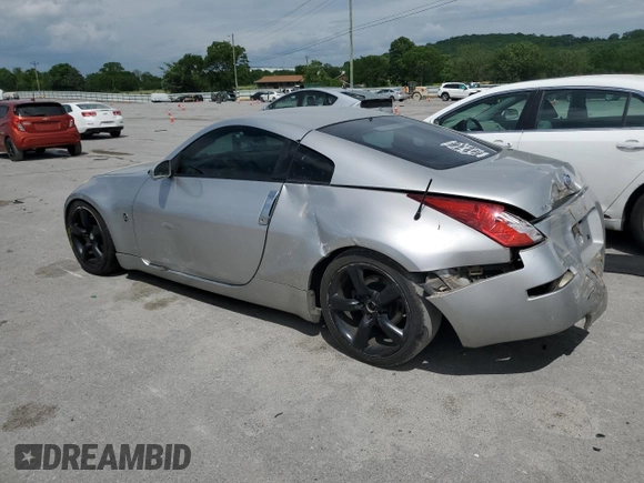 2003 Nissan 350Z Performance z VIN JN1AZ34D63T102739, wystawiony jako Copart lot #55443655 z przebiegiem 162 672 mil mil oraz Tytuł czysty. Historia ofert i sprzedaży dostępna na DreamBid. Obrazek 2.