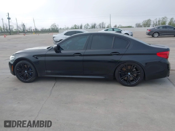 2019 BMW M5 z VIN WBSJF0C51KB447804, wystawiony jako IAAI lot #41848760 z przebiegiem 83 303 mil mil oraz . Historia ofert i sprzedaży dostępna na DreamBid. Obrazek 14.