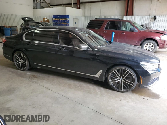 2017 BMW 7 Series 740i with VIN WBA7E2C36HG741125, listed as a Copart auction lot 55754185 with 90,305 mi miles and Clean Title. Bid and sale history available at DreamBid. Image 4.