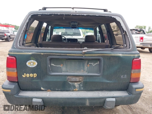 1993 Jeep Grand Cherokee Limited with VIN 1J4GZ78Y2PC540394, listed as a IAAI auction lot 42171655 with 94,417 mi miles and . Bid and sale history available at DreamBid. Image 6.