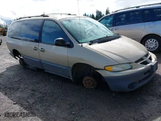 1999 Dodge Caravan LE with VIN 1B4GP54LXXB864478, listed as a IAAI auction lot 41978798 with 180,036 mi miles. Bid and sale history available at carsss.com. Image 1.