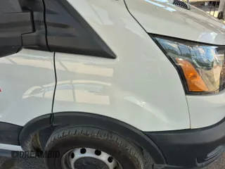 2020 Ford Transit Cargo z VIN 1FTYE1C89LKA17335, wystawiony jako IAAI lot #42561511 z przebiegiem 276 728 mil mil oraz . Historia ofert i sprzedaży dostępna na DreamBid. Obrazek 27.