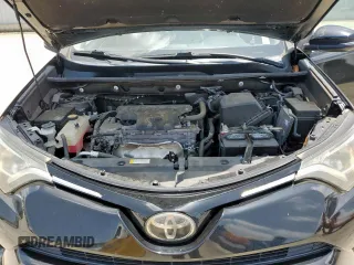 2018 Toyota RAV4 XLE with VIN 2T3WFREV2JW433186, listed as a Copart auction lot 61008705 with 57,310 mi miles and Salvage title. Bid and sale history available at DreamBid. Image 12.