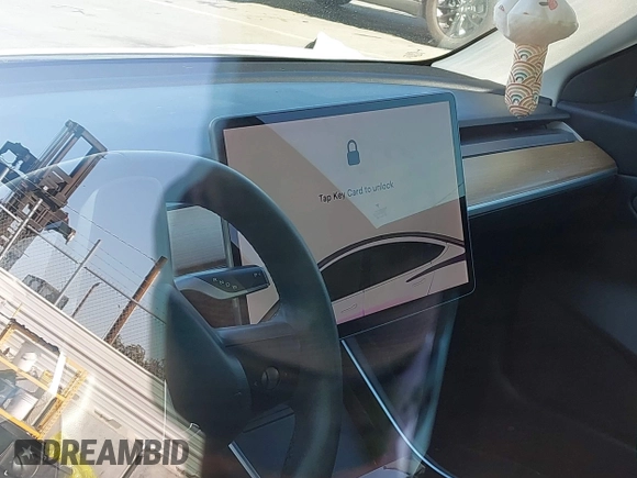 2019 Tesla Model 3 Long Range with VIN 5YJ3E1EB1KF510912, listed as a IAAI auction lot 41857775 with Not Provided miles and . Bid and sale history available at DreamBid. Image 7.