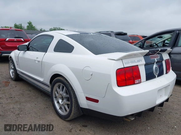2007 Ford Mustang Shelby GT500 z VIN 1ZVHT88SX75317986, wystawiony jako IAAI lot #42310721 z przebiegiem 44 643 mil mil oraz . Historia ofert i sprzedaży dostępna na DreamBid. Obrazek 3.