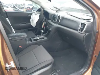 2018 Kia Sportage LX with VIN KNDPM3AC9J7481047, listed as a IAAI auction lot 41636184 with 160,385 mi miles. Bid and sale history available at carsss.com. Image 5.