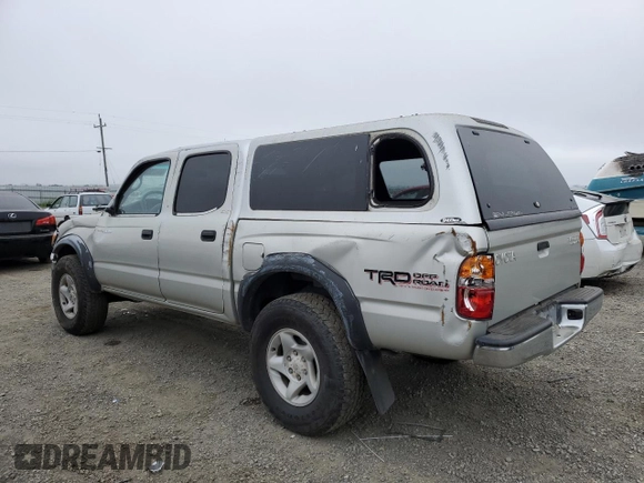 2002 Toyota Tacoma PreRunner with VIN 5TEGN92N32Z890493, listed as a Copart auction lot 53275565 with 184,521 mi miles and Salvage Title. Bid and sale history available at DreamBid. Image 2.