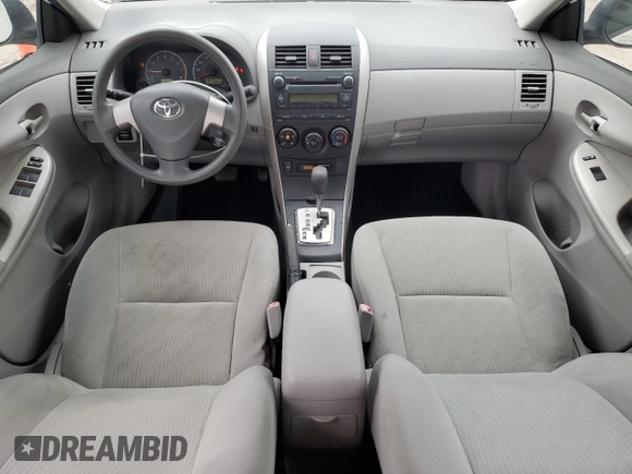 2010 Toyota Corolla with VIN 1NXBU4EE7AZ256666, listed as a Copart auction lot 79097074 with 65,537 mi miles and Salvage title. Bid and sale history available at DreamBid. Image 8.