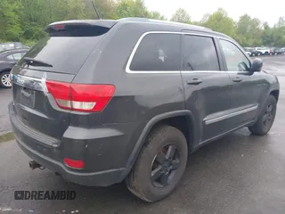 2011 Jeep Grand Cherokee Laredo with VIN 1J4RR4GGXBC604304, listed as a IAAI auction lot 42201742 with 196,483 mi miles and . Bid and sale history available at DreamBid. Image 4.