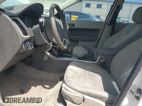 2009 Ford Focus SE with VIN 1FAHP35N59W231870, listed as a Copart auction lot 53349585 with 175,741 mi miles and Salvage Title. Bid and sale history available at carsss.com. Image 7.
