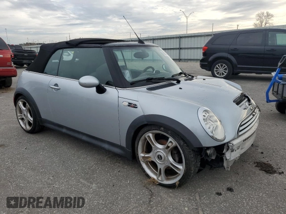 2005 MINI Convertible S with VIN WMWRH33575TK56034, listed as a Copart auction lot 88043565 with 33,410 mi miles and Salvage title. Bid and sale history available at DreamBid. Image 4.