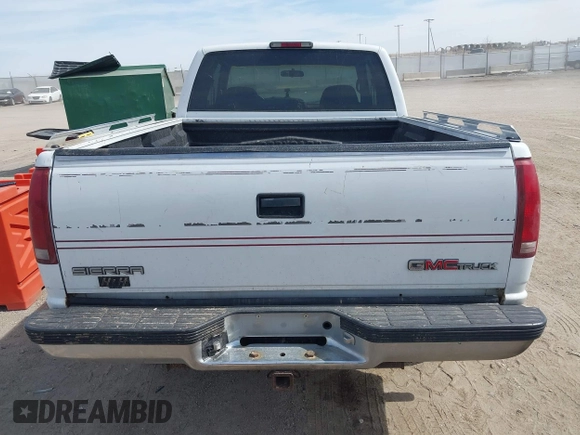 1995 GMC Sierra 1500 z VIN 2GTEK19K0S1580688, wystawiony jako IAAI lot #41811015 z przebiegiem 143 260 mil mil oraz . Historia ofert i sprzedaży dostępna na DreamBid. Obrazek 16.