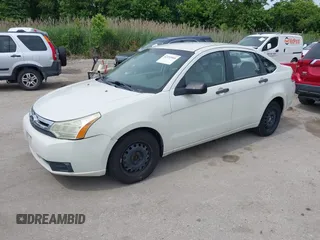 2010 Ford Focus S z VIN 1FAHP3ENXAW277313, wystawiony jako IAAI lot #42353466 z przebiegiem 210 620 mil mil oraz . Historia ofert i sprzedaży dostępna na DreamBid. Obrazek 2.
