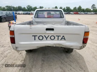 1992 Toyota Pickup z VIN 4TARN81A9NZ011107, wystawiony jako Copart lot #59125725 z przebiegiem 190 647 mil mil oraz Szkoda całkowita • Salvage title. Historia ofert i sprzedaży dostępna na DreamBid. Obrazek 6.