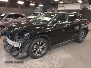 2021 Lexus RX with VIN 2T2HZMDA2MC279445, listed as a IAAI auction lot 41913178 with 38,598 mi miles. Bid and sale history available at carsss.com. Image 2.