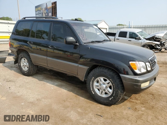 1998 Lexus LX 470 z VIN JT6HT00W0W0022045, wystawiony jako Copart lot #64022034 z przebiegiem 207 846 mil mil oraz Szkoda całkowita • Salvage title. Historia ofert i sprzedaży dostępna na DreamBid. Obrazek 4.