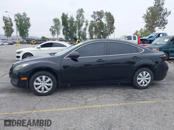 2012 Mazda 6 i Sport with VIN 1YVHZ8BH6C5M03802, listed as a IAAI auction lot 42041022 with 202,047 mi miles and . Bid and sale history available at carsss.com. Image 14.