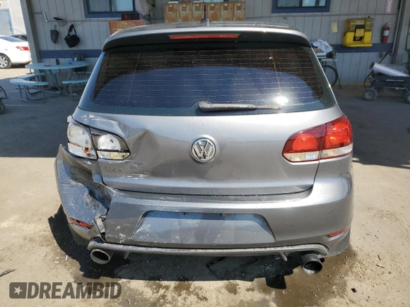 2013 Volkswagen GTI w/Conv & Sunroof z VIN WVWFD7AJ4DW031740, wystawiony jako Copart lot #70099084 z przebiegiem 130 193 mil mil oraz Szkoda całkowita • Salvage title. Historia ofert i sprzedaży dostępna na DreamBid. Obrazek 6.