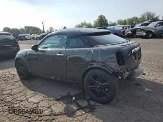 2012 MINI Coupe z VIN WMWSX1C57CT163911, wystawiony jako Copart lot #65001404 z przebiegiem 101 939 mil mil oraz Szkody całkowita. Historia ofert i sprzedaży dostępna na DreamBid. Obrazek 2.