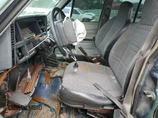 1996 Jeep Cherokee SE with VIN 1J4FT28S5TL244548, listed as a Copart auction lot 68908934 with 182,507 mi miles and Salvage Title. Bid and sale history available at carsss.com. Image 7.