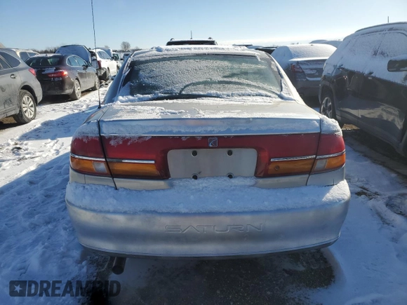 2000 Saturn LS z VIN 1G8JU52F5YY672182, wystawiony jako Copart lot #41998455 z przebiegiem 207 539 mil mil oraz Czysty tytuł • Clean title. Historia ofert i sprzedaży dostępna na DreamBid. Obrazek 6.