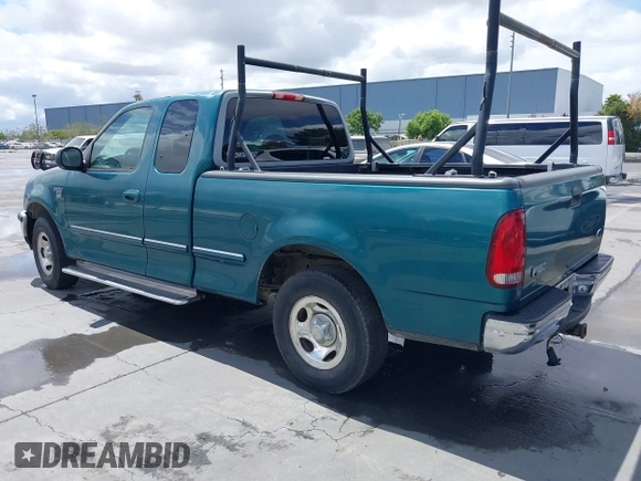 1998 Ford F-150 with VIN 1FTZX1760WKA90900, listed as a IAAI auction lot 42239510 with 198,405 mi miles and . Bid and sale history available at DreamBid. Image 3.