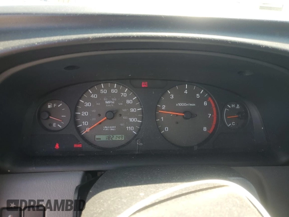 2000 Nissan Frontier XE z VIN 1N6ED26Y7YC392971, wystawiony jako Copart lot #61301035 z przebiegiem 182 149 mil mil oraz Czysty tytuł • Clean title. Historia ofert i sprzedaży dostępna na DreamBid. Obrazek 9.