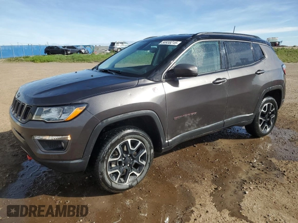 2021 Jeep Compass Trailhawk with VIN 3C4NJDDB7MT533137, listed as a Copart auction lot 56938215 with 92,507 mi miles and Salvage title. Bid and sale history available at DreamBid. Image 1.