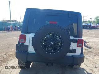 2018 Jeep Wrangler Unlimited Sport S with VIN 1C4HJWDG8JL928813, listed as a IAAI auction lot 42281021 with 71,001 mi miles and . Bid and sale history available at DreamBid. Image 17.