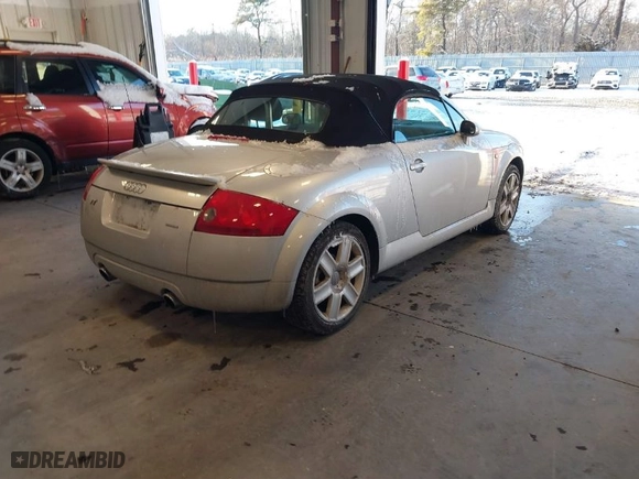 2004 Audi TT with VIN TRUUT28N141023216, listed as a IAAI auction lot 41386891 with 124,395 mi miles. Bid and sale history available at carsss.com. Image 4.