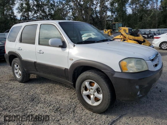 2006 Mazda Tribute S with VIN 4F2YZ06116KM28522, listed as a Copart auction lot 83670154 with Not Provided miles and Non Repairable. Bid and sale history available at carsss.com. Image 4.