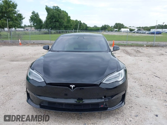 2022 Tesla Model S with VIN 5YJSA1E51NF472152, listed as a IAAI auction lot 42625943 with 60,290 mi miles and . Bid and sale history available at DreamBid. Image 6.